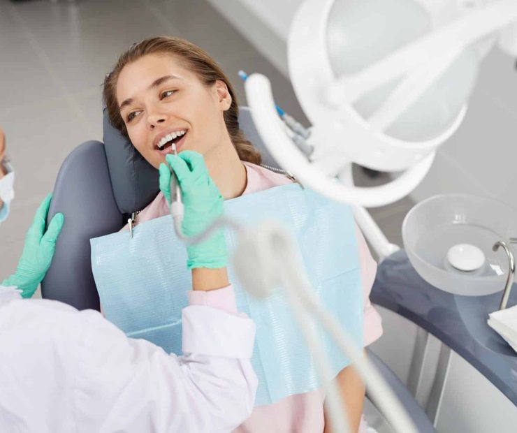 young-woman-at-dental-exam-3XD85GH.jpg